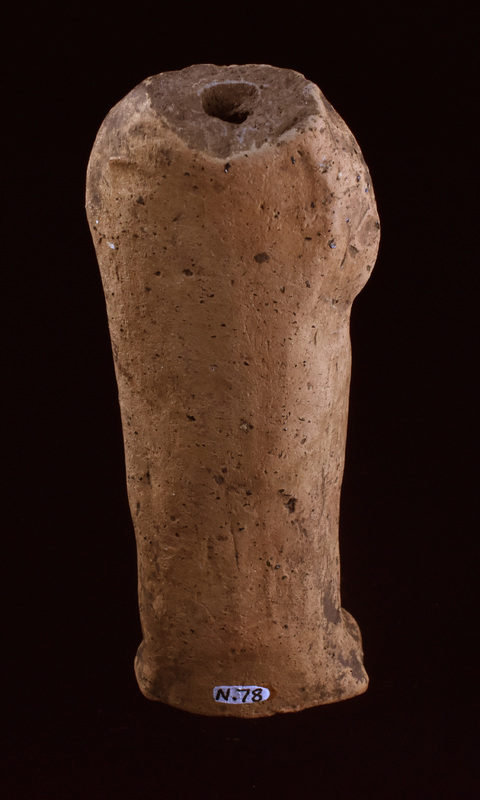 Mouldmade standing figure of Sophoclean type w r arm bent at elbow w hand resting at middle of chest, l arm at side holding folds of drapery which fall  down at l side of body; r leg bent at knee.  Low profiled base articulated only at front.